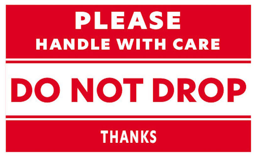 Shipping and handling label Handle with care do not drop