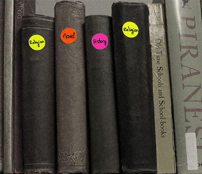 Stickers that color code books based on genre